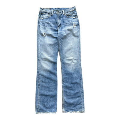 Vintage Levi's 507 Bootcut Jeans in W31, dunkelblaue Denim-Hosen mit geradem Bein, klassische Passform, sichtbare Nähte.
