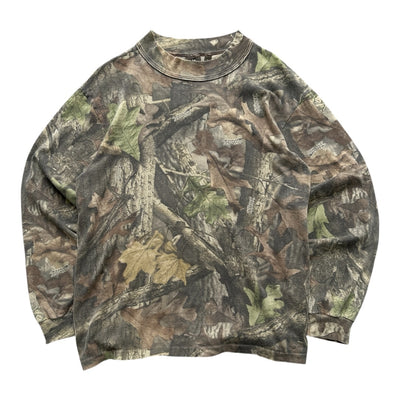 Vintage Real Tree Camo Langarmshirt aus den USA, langlebiges Baumwollmaterial, bequem geschnitten, mit Tarnmuster und Vintage-Branding.