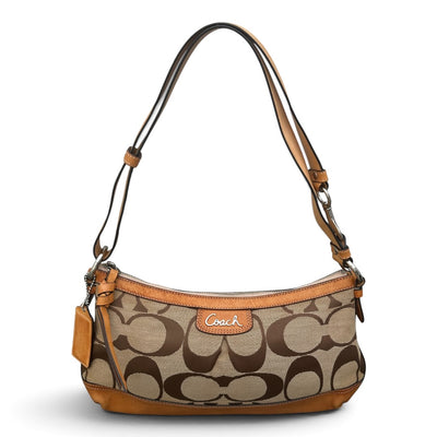 Coach Vintage Signature Schultertasche aus Monogram Canvas und Leder, beige und braun, mit verstellbarem Schultergurt.