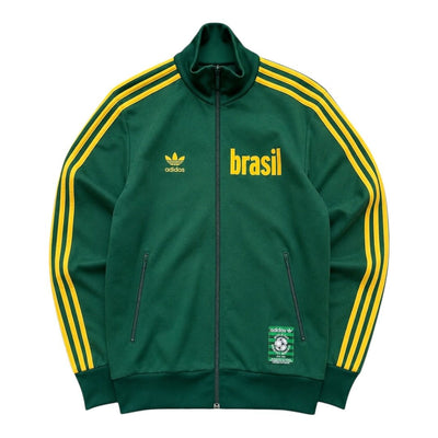 Adidas Originals Brasil 1970 Trackjacke in Grün und Gelb, sportliche Jacke mit retro Design, für Fans des brasilianischen Fußballstils.