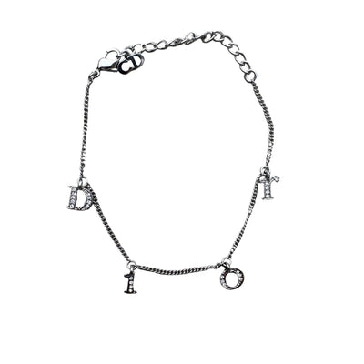 Christian Dior Silber Spellout Bracelet - vintageconcierge