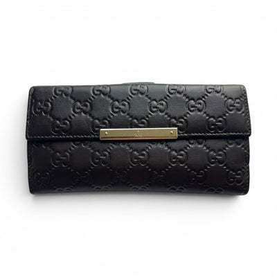 Gucci Guccissima Leder Geldbörse mit Metallstange in Dunkelbraun, elegante kontinentale Brieftasche aus hochwertigem Leder.