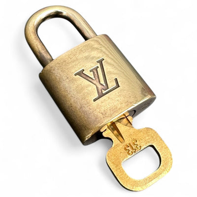 Louis Vuitton Padlock & Key Gold - vintageconcierge