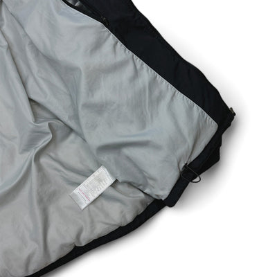 Nike Vintage 90s Rare Down Spellout Pufferjacke Schwarz - vintageconcierge