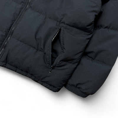 Nike Vintage 90s Rare Down Spellout Pufferjacke Schwarz - vintageconcierge