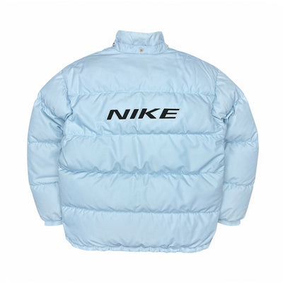 Nike Vintage 90s Rare Spellout Pufferjacke BabyBlau - vintageconcierge